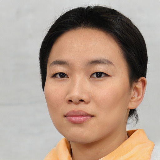 Neutral asian young-adult female with short  black hair and brown eyes