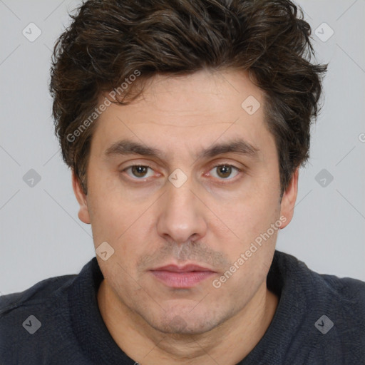 Neutral white adult male with short  brown hair and brown eyes