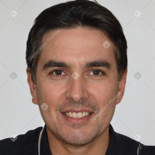 Joyful white young-adult male with short  black hair and brown eyes