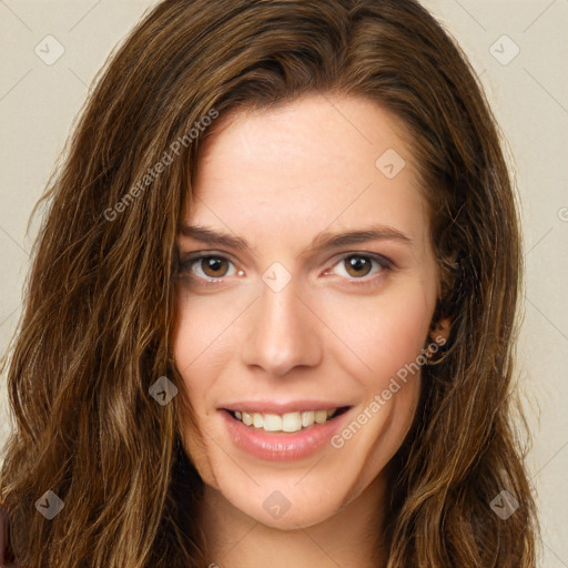 Joyful white young-adult female with long  brown hair and green eyes