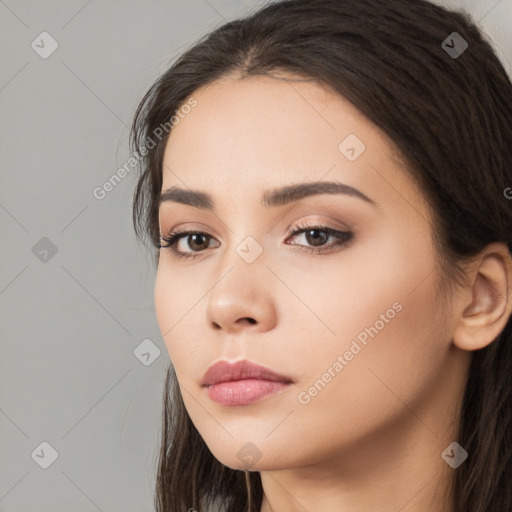 Neutral white young-adult female with long  black hair and brown eyes