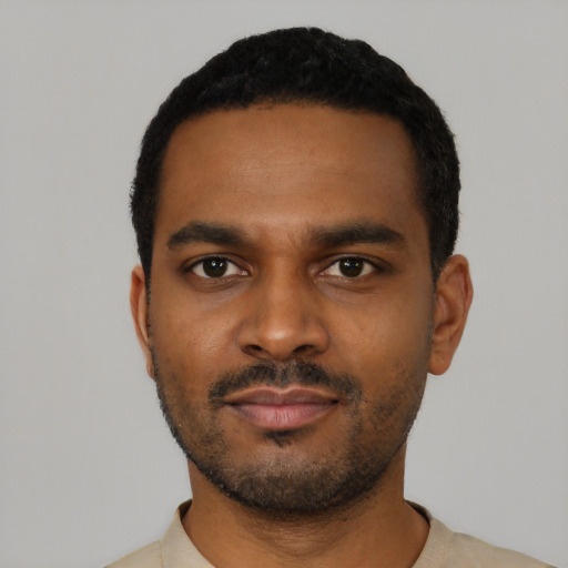Neutral black young-adult male with short  black hair and brown eyes