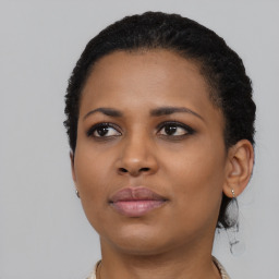 Neutral black young-adult female with short  black hair and brown eyes