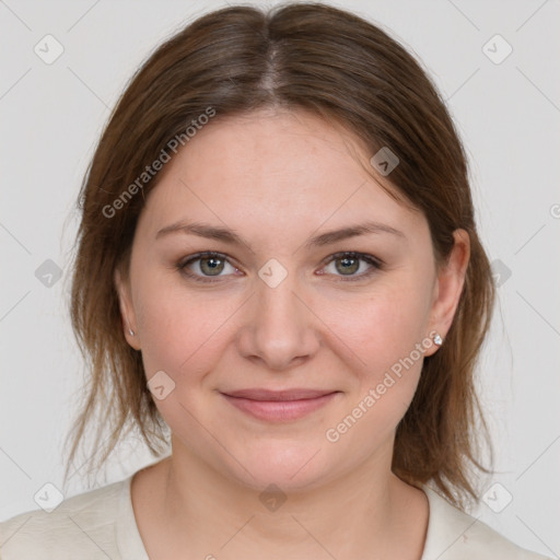 Joyful white young-adult female with medium  brown hair and grey eyes