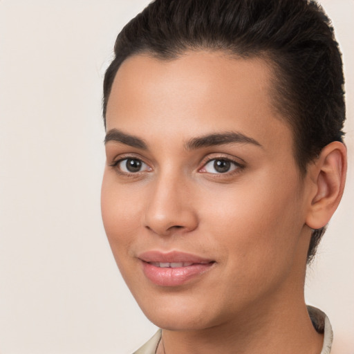 Joyful white young-adult female with short  brown hair and brown eyes