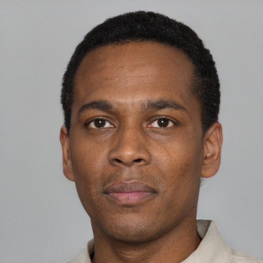 Neutral black young-adult male with short  black hair and brown eyes