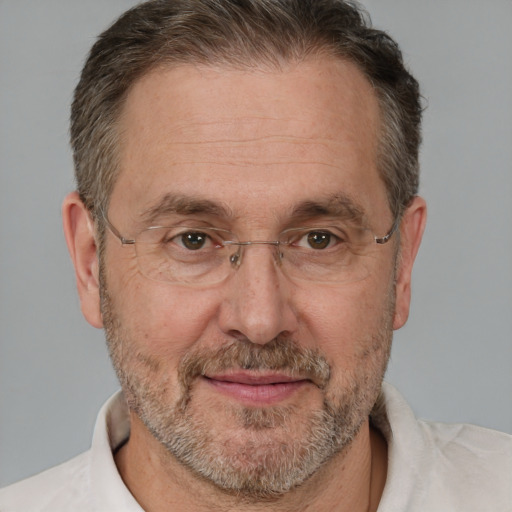 Joyful white middle-aged male with short  brown hair and brown eyes