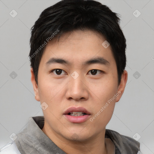 Neutral asian young-adult male with short  black hair and brown eyes