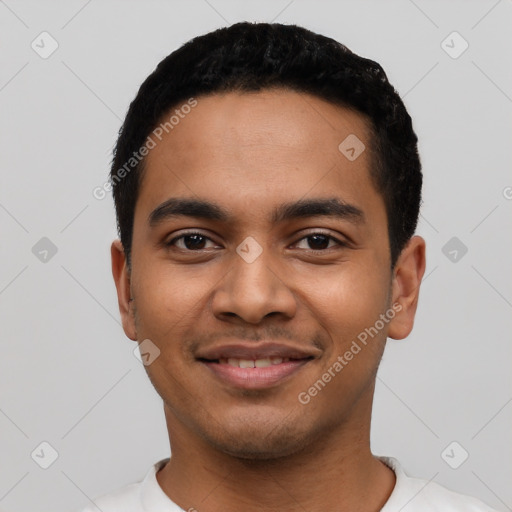 Joyful latino young-adult male with short  black hair and brown eyes