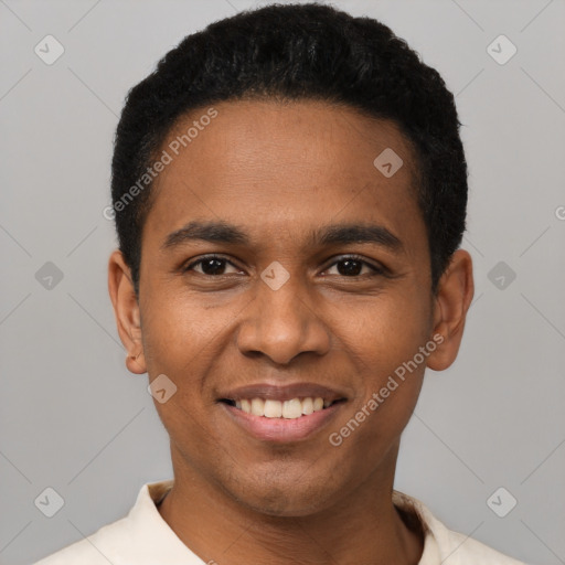 Joyful black young-adult male with short  black hair and brown eyes