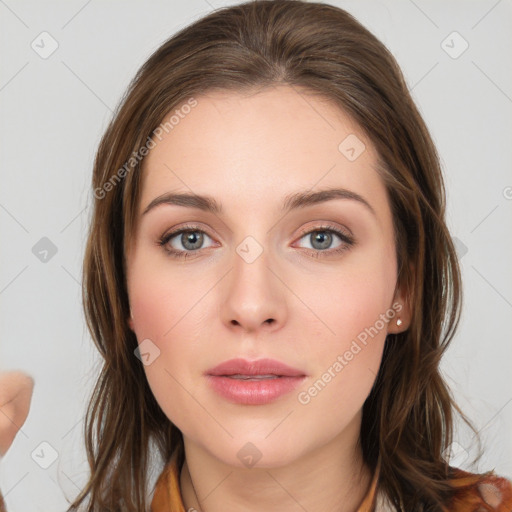 Neutral white young-adult female with long  brown hair and brown eyes