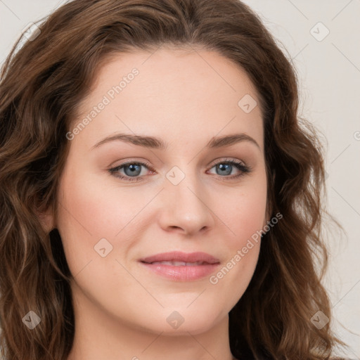 Joyful white young-adult female with long  brown hair and green eyes