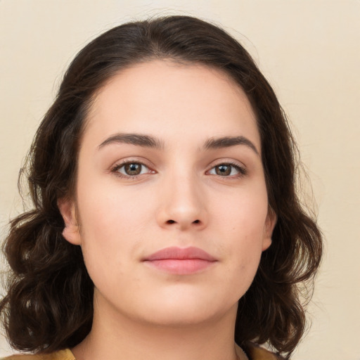 Neutral white young-adult female with medium  brown hair and brown eyes