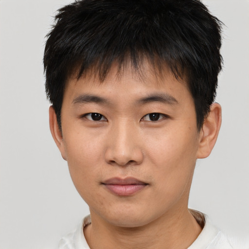 Neutral asian young-adult male with short  brown hair and brown eyes