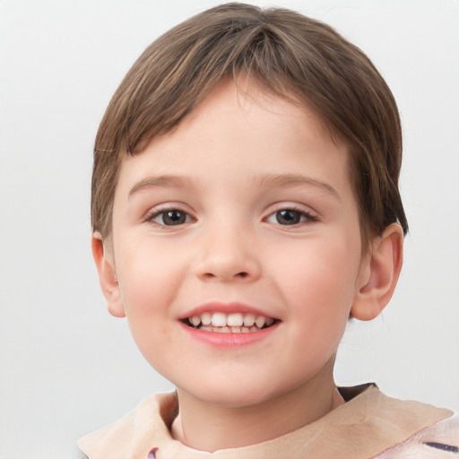 Joyful white child female with short  brown hair and grey eyes