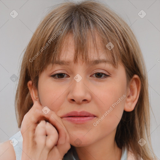 Neutral white young-adult female with medium  brown hair and brown eyes