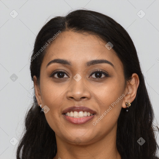 Joyful latino young-adult female with long  black hair and brown eyes