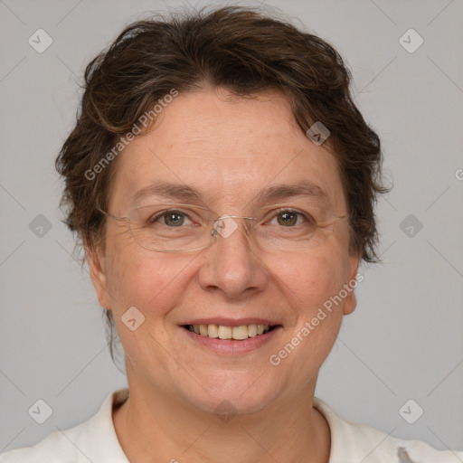 Joyful white adult female with short  brown hair and brown eyes