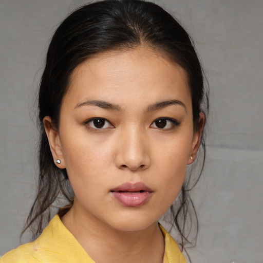 Neutral white young-adult female with medium  brown hair and brown eyes