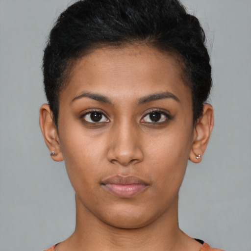 Neutral latino young-adult female with short  black hair and brown eyes