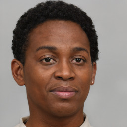 Neutral black young-adult female with short  brown hair and brown eyes