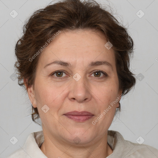 Joyful white adult female with short  brown hair and brown eyes