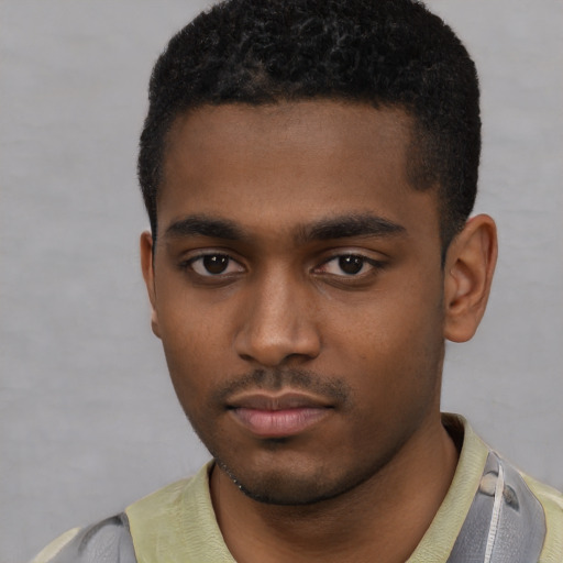 Neutral black young-adult male with short  black hair and brown eyes