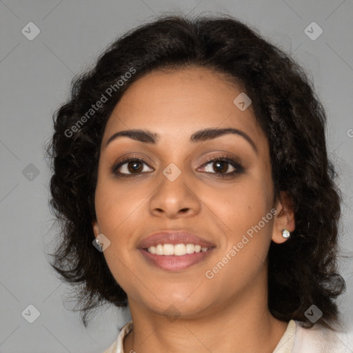 Joyful latino young-adult female with medium  brown hair and brown eyes