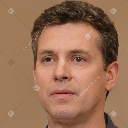 Neutral white adult male with short  brown hair and brown eyes