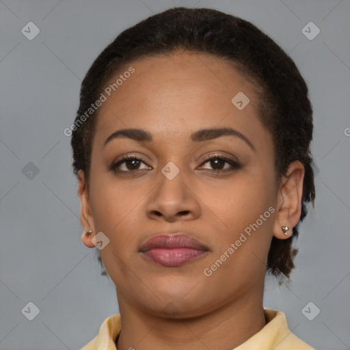 Joyful latino young-adult female with short  brown hair and brown eyes