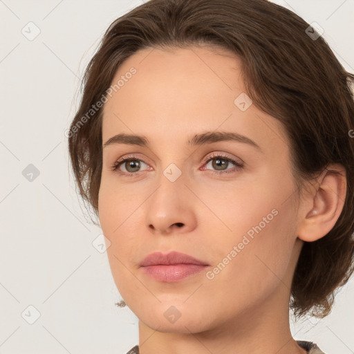 Neutral white young-adult female with medium  brown hair and brown eyes