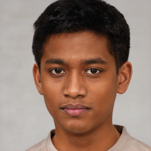 Neutral black young-adult male with short  black hair and brown eyes