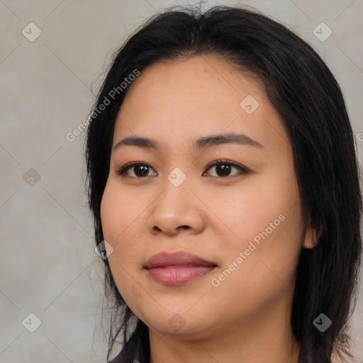 Joyful asian young-adult female with medium  black hair and brown eyes