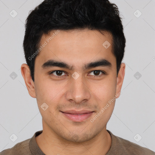 Joyful latino young-adult male with short  brown hair and brown eyes