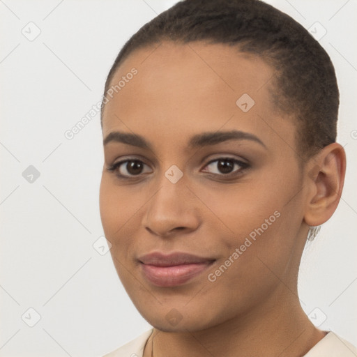 Joyful latino young-adult female with short  brown hair and brown eyes