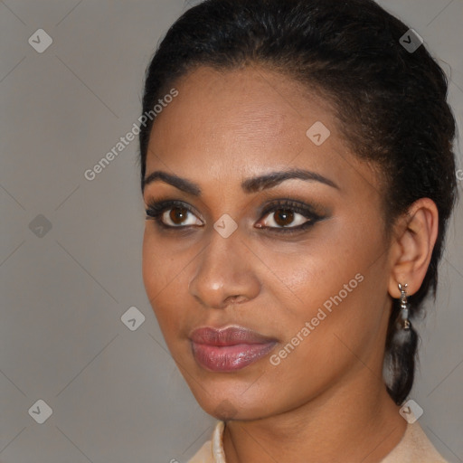 Joyful black young-adult female with medium  brown hair and brown eyes