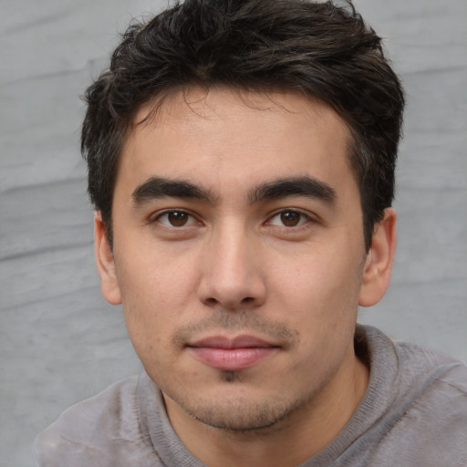 Neutral white young-adult male with short  black hair and brown eyes