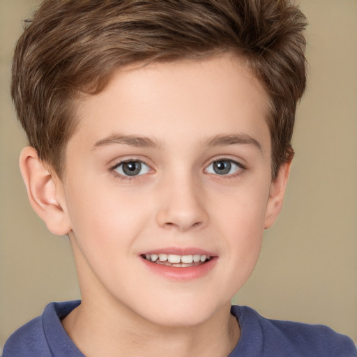 Joyful white child male with short  brown hair and brown eyes