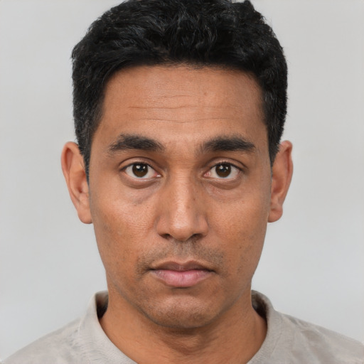 Neutral asian young-adult male with short  black hair and brown eyes