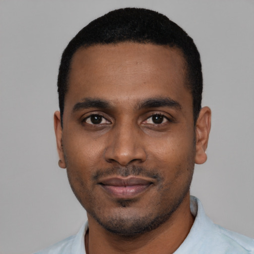 Neutral black young-adult male with short  black hair and brown eyes