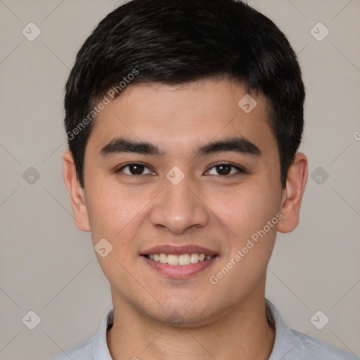 Joyful white young-adult male with short  black hair and brown eyes