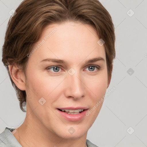 Joyful white young-adult female with short  brown hair and grey eyes