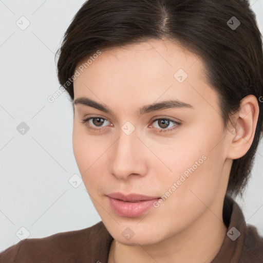 Neutral white young-adult female with medium  brown hair and brown eyes