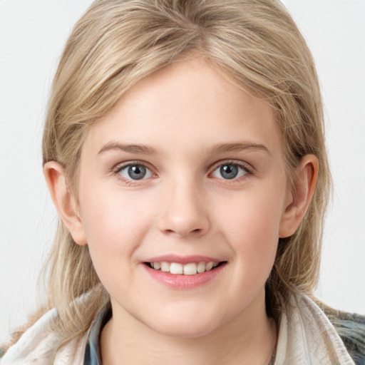 Joyful white child female with long  brown hair and blue eyes