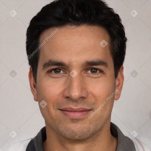 Joyful white young-adult male with short  black hair and brown eyes