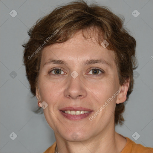 Joyful white adult female with medium  brown hair and blue eyes