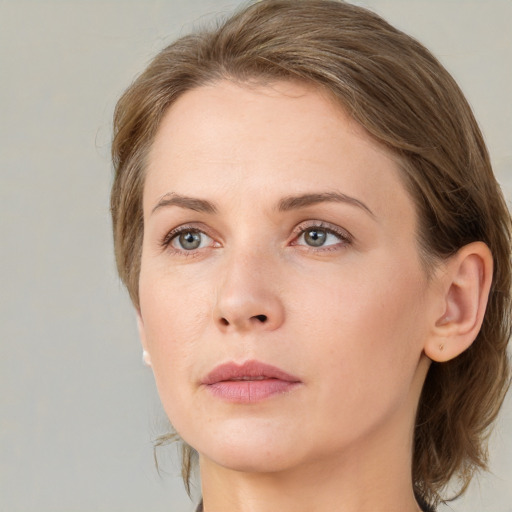 Neutral white young-adult female with medium  brown hair and grey eyes