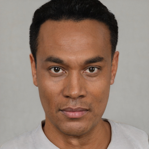 Neutral black young-adult male with short  black hair and brown eyes