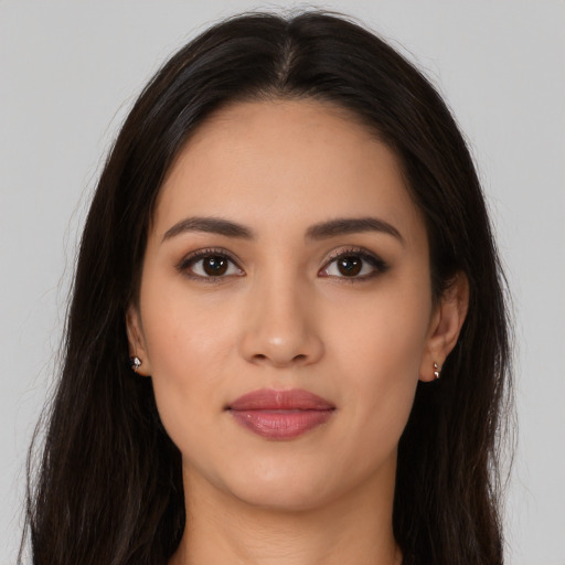 Neutral latino young-adult female with long  brown hair and brown eyes