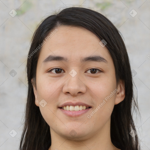 Joyful asian young-adult female with medium  brown hair and brown eyes